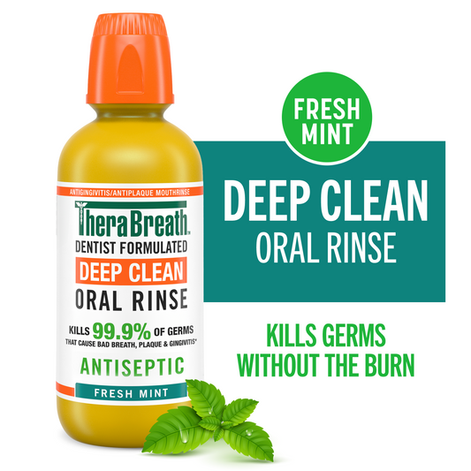 A yellow bottle of TheraBreath deep clean-oral-rinse Fresh Mint flavor on a white background with the words "kills germs without the burn"